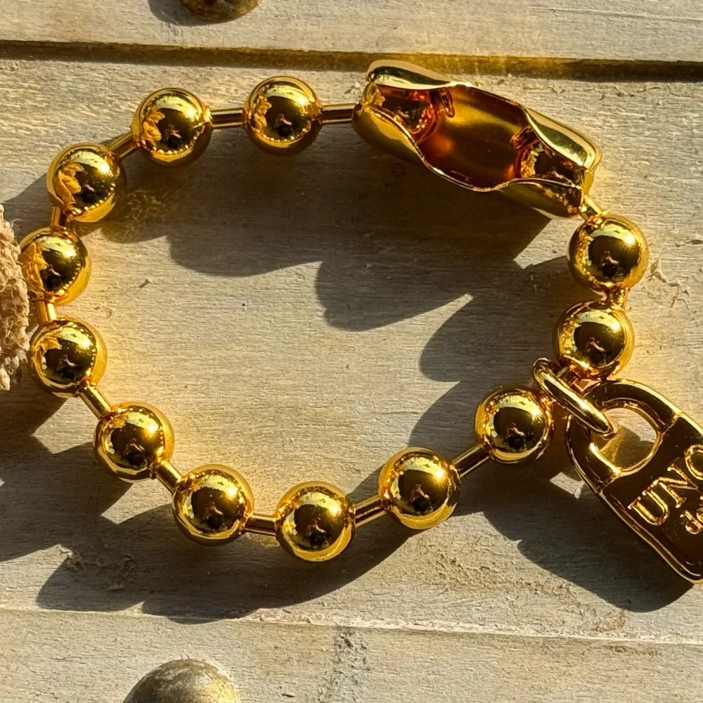 UNO de 50 elegant gold